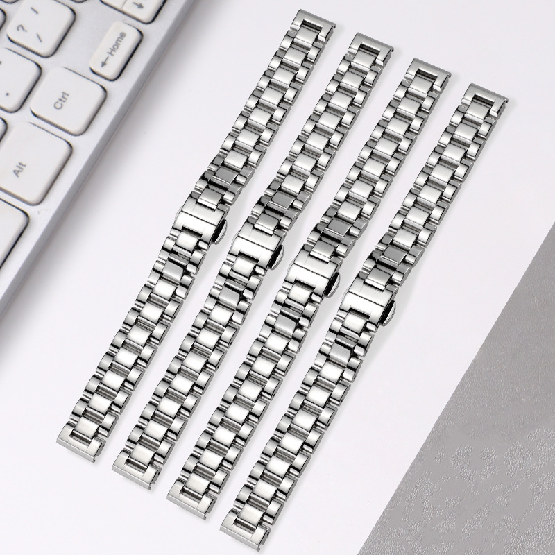 Four three-link traditional watch bracelets