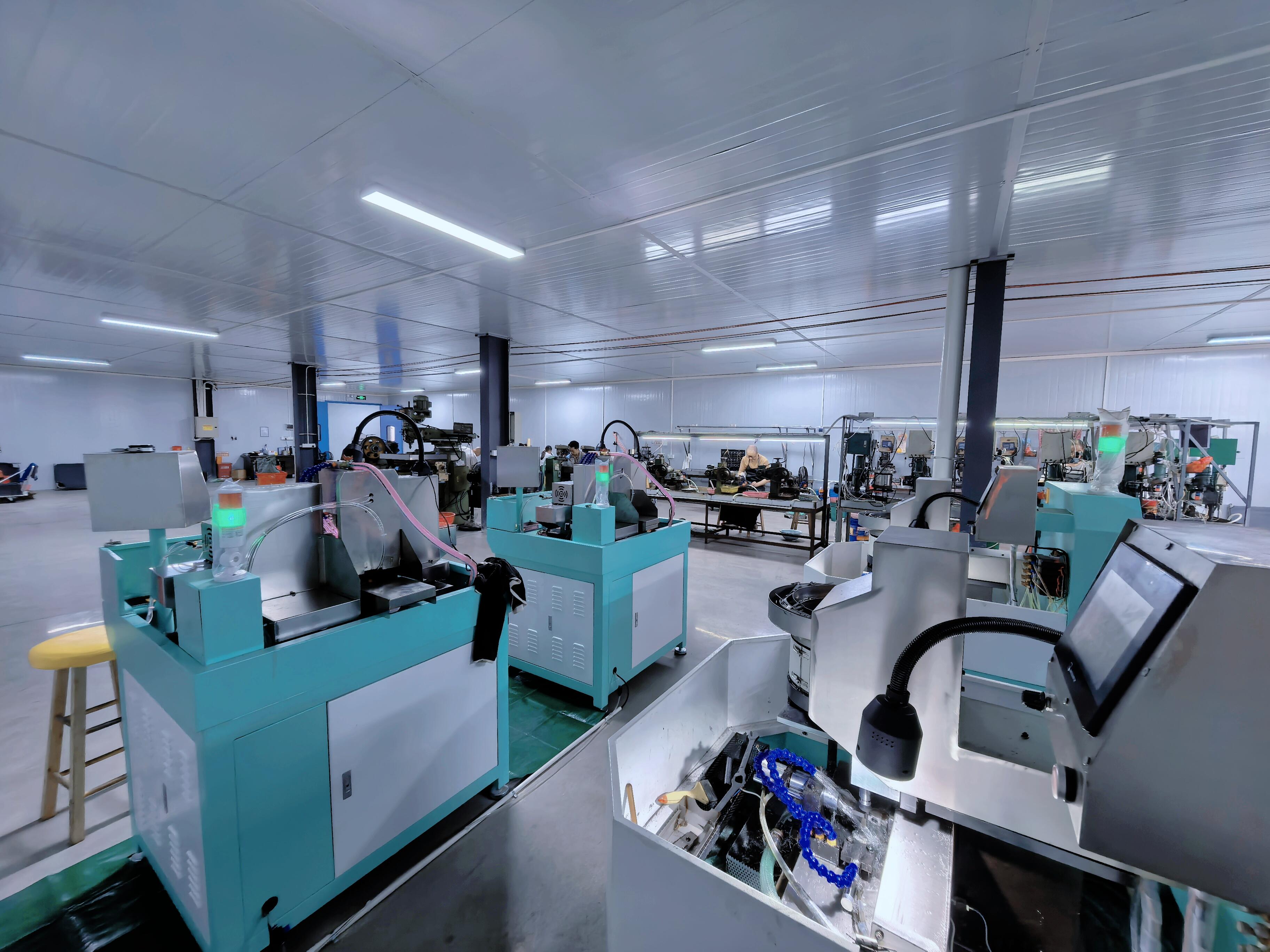 Factory workshop with metalworking machinery and workstations